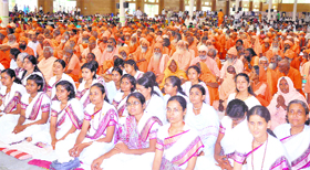The student-saint community attends a programme at Patanjali Yogpeeth in Haridwar on Thursday.
