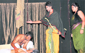 Actors stage a play Agni Varsha at Desh Bhagat Yadgaar Hall in Jalandhar.