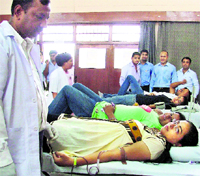 Volunteers at a blood donation camp on the PAU campus in Ludhiana on Thursday