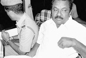 Former Tamil Nadu Minister and DMK leader NKKP Raja being taken into custody in Erode on Thursday