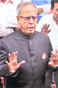 Finance Minister Pranab Mukherjee comes out after tabling the Lokpal Bill at Parliament in New Delhi on Thursday