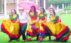 Students of MCMDAV College dance in the rain at a freshers day function held on the college campus in Sector 36, Chandigarh