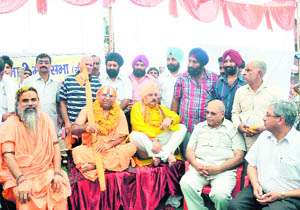 Mahants participate in the Punjabi Jagriti Yatra in Dehradun on Friday. 
