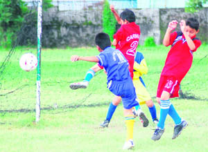 Players in action in the Carbery Memorial Inter-school Sub-junior Football Tournament in Dehradun on Friday.