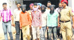 The gang members, who used to dupe people of their money, in police custody in Ludhiana