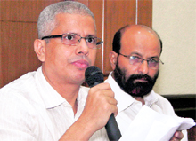 ULFA senior leaders Sasha Chaudhary and Pradip Gogoi (R) address media representatives in New Delhi on Friday