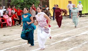 Women participating in a sports event organised by the Devta Yadgari Malwa Kalakaar Manch on the inaugural day of Teej celebrations in Bathinda on Saturday.