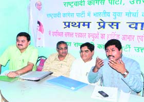 Divya Nautiyal (right), president of the Uttarakhand unit of the Nationalist Congress Party, addresses a press conference in Dehradun on Saturday