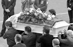 Coffin of one of the teenagers shot dead in Norway being carried by pall bearers