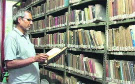 Books not in a readable condition at a library in the Rose Garden in Ludhiana.