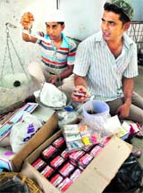 A customer buys dates during the month of Ramzan in Patiala on Saturday. 