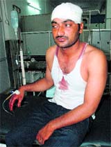 Pradeep, who was injured in a clash with robbers, at General Hospital, Sector 6, Panchkula. 