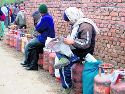 A long queue of LPG cylinders at a gas agency godown in Dehradun