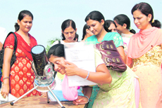 Teachers acquaint themselves with various aspects of astronomy during a workshop at the Kalpana Chawla Memorial Planetarium in Karnal on Sunday. 
