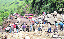Boulders and landslides continue to be hazards on the NH-21 between Mandi and Pandoh on Sunday.