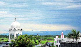 A view of the cloudy sky after heavy rain in Jammu on Sunday. 