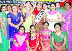 Miss Teej Amanpreet Kaur, along with runners-up and others, at Guru Har Gobind Khalsa Senior Secondary School, Mandi Ahmedgarh