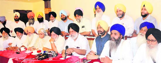 Panthic Morcha leaders addressing mediapersons in Chandigarh on Sunday
