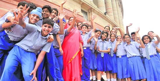 MEMORABLE MOMENT: Children of Drishti Dr RC Jain Innovative Public School in Pakhowal (Ludhiana) wave after a visit to Parliament in New Delhi on Friday