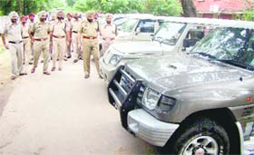 The police with the recovered cars at the Police Lines in Patiala on Sunday