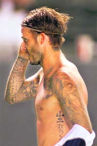 David Beckham of LA Galaxy sports a new tattoo of his newborn daughter's name "Harper" on the left side of his neck after the match against FC Dallas at The Home Depot Center in California on Sunday