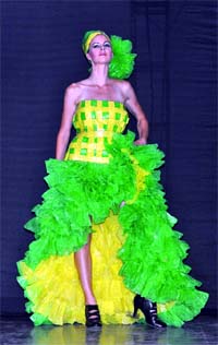 A model showcases a dress made of polythene and plastic waste during a fashion show of tribal attires of Arunachal Pradesh in New Delhi on Sunday night.