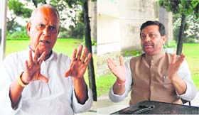 Brij Bhushan Tiwari, national vice-president of the Samajwadi Party, and Javed Raza, general secretary of the JD (U), in Dharamsala on Monday