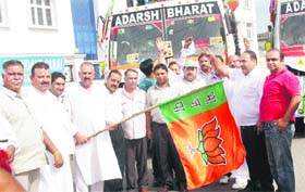 State BJP president Shamsher Singh Manhas flags off activists of the Bharatiya Janata Yuva Morcha from Jammu on Monday