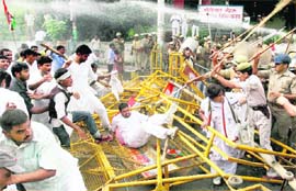 Youth Congress activists protesting against the Uttar Pradesh Government being lathi-charged by the police in Lucknow on Monday. According to the police, the agitators tried to break police cordon and move toward Vidhan Bhawan. Over 20 agitators were injured in the lathicharge