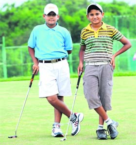 Up and coming: Golfers Kartick Digvijay (L) and Chinmaya Mahajan at the CGA Range in Chandigarh
