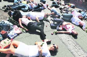 People take part in an Amnesty International demonstration in solidarity with Syrias protesters in Berlin