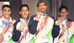 Winners strike a pose with their medals in Chandigarh