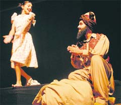 Artistes perform during the play Kabuliwallah atTagore Theatre in Chandigarh