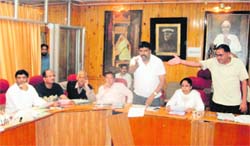 Ward members argue at a Municipal Council meeting in Mussoorie
