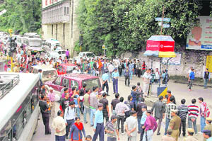Activists of the ABVP block traffic at the Victory Tunnel in Shimla against corruption on Tuesday