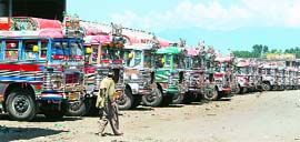 Private buses parked in Srinagar on Tuesday following a strike by traders and transporters.