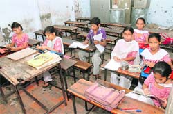 Empty desks show the decreased number of students at Government Elementary School, Gali No 2, Avtar Nagar, in Jalandhar