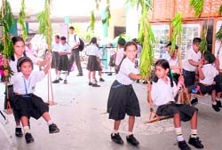 With monsoon season still on, students of MGN Public School enjoy swings as a part of the Teej celebration in Jalandhar
