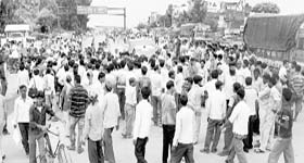Suppliers of construction material block the Zirakpur-Panchkula highway near Baltana on Wednesday