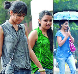  Girls enjoy in the rain in New Delhi 