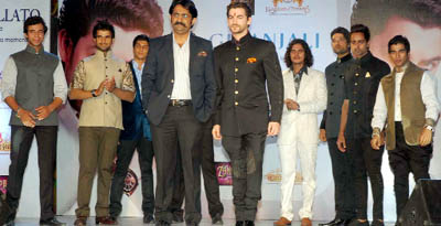 Actor Neil Nitin Mukesh walks the ramp with models during a fashion show in Gurgaon 