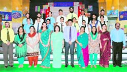 Winners of various contests at "Mindspree" along with their teachers in Dehradun on Wednesday