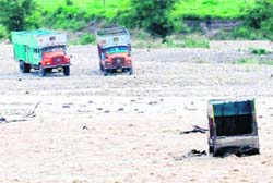 Illegal quarrying continues on the Ganga bed in Haridwar on Wednesday