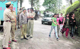 Cops patrol on the Himachal Pradesh University campus after a clash between activists of the ABVP and the SFI in Shimla 