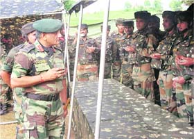 The Chief of the Army Staff, Gen VK Singh, interacts with troops on the Line of Control in the Rajouri sector on Wednesday