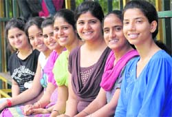 Toppers of Guru Nanak Girls College, Model Town, strike a pose in Ludhiana.