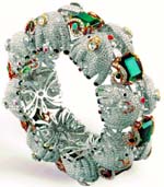 A bangle, made up of approximately 160 gm of gold with 4,259 diamonds of 59 carats and eight emeralds of 53 carats with a price tag of over Rs 1 crore, at an exhibition in Vadodara on Thursday