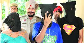Himanshu, his mother Sudesh Kapila and Vipul Luthra in the police custody in Jalandhar on Thursday.