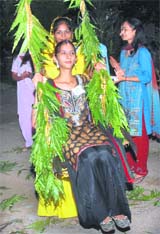 Students of the Lyallpur Khalsa College for Women celebrate Teej in Jalandhar on Thursday.