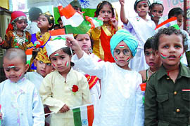Tiny-tots of the Daddy's Teddy exhibit patriotric spirit during a function organised to mark the Independence Day in Bathinda 